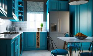 Kitchen having blue color at Urban Skyline Phase 2