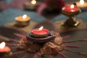 Living room decorated with diyas and flowers in Urban Skyline Phase 2 apartments for Diwali