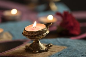 Prayer corner glowing with diyas and flowers at Urban Skyline Phase 2